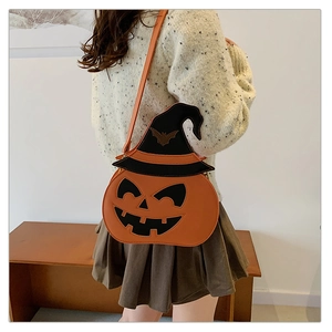 Detailed side view of Halloween pumpkin crossbody bag with wizard hat and adjustable strap
