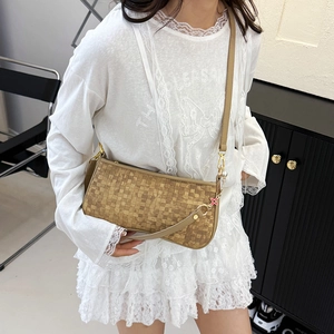 Minimalist beige checkered pillow bag with pearl floral charm for women's crossbody wear