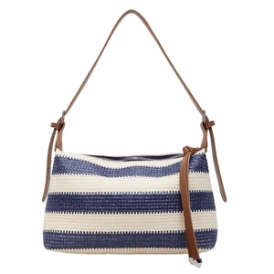 Navy and beige striped woven pillow bag with brown leather straps and zip top