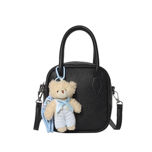 Black square crossbody bag with lychee texture leather and a cute teddy bear charm