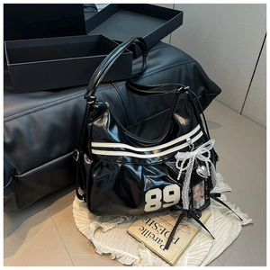 Y2K style black glossy large tote bag with number 89 patch and lace butterfly charm