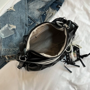 Y2K style shiny black pleated shoulder bag with lace pearl charms and spacious interior
