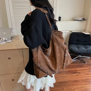Chic large capacity brown tote bag in vintage faux leather with metal buckle straps