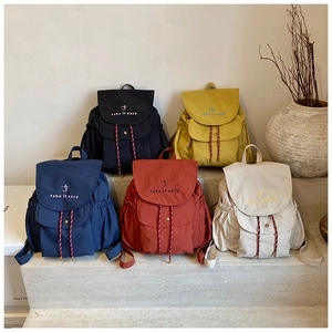 Collection de sacs à dos décontractés en toile en cinq couleurs avec broderie 'take it easy'