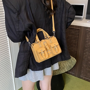 Chic yellow multi-pocket mini crossbody bag with rivets and top handle for women