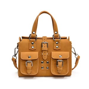 Chic mustard yellow satchel handbag with dual front pockets and silver buckles