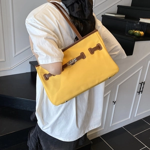 Retro contrast stitching yellow tote bag with metal lock and leather strap crossbody