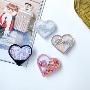 Herz-Handyhalterung mit Treibsand-Effekt, Glitzer und Perlen in vier stylischen Designs