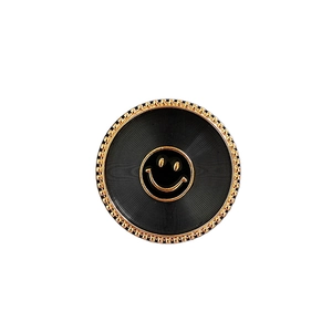 Foldable round phone socket grip with black enamel smiling face and golden wavy edge