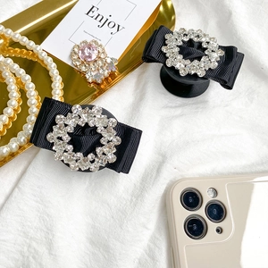 Luxury rhinestone bow-knot retractable phone grip stand set for elegant desk accessory