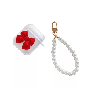 Clear TPU case for AirPods with red velvet bow and faux pearl beaded gold keychain