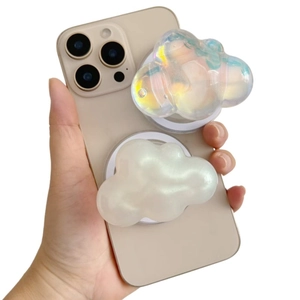 Close-up of magnetic cloud phone grips in iridescent and pearl white finishes
