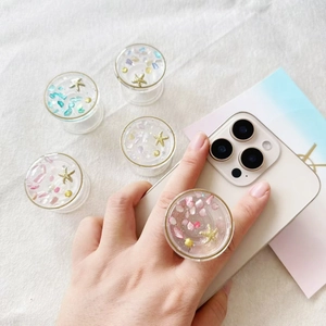 Ocean themed resin phone grip set with starfish, seashells and glitter in various colors