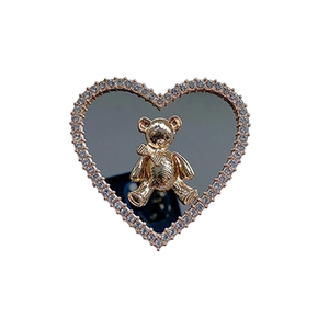 Heart-shaped foldable phone socket with golden bear, mirror finish, and rhinestone trim