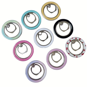 Flat lay of nine colorful zinc alloy MagSafe ring holders in matte and gradient finishes