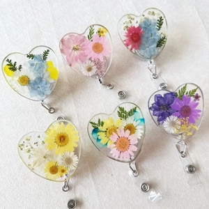 Retractable heart-shaped badge reel with real dried flowers for nurses and doctors