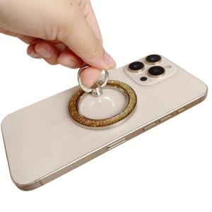 Glittering gold MagSafe magnetic ring holder for phone on desk with zinc alloy finish
