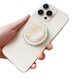 Iridescent seashell pattern MagSafe phone socket stand with pearlescent finish