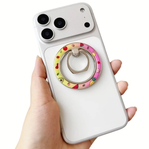 Detail of white phone case with rotating magnetic fruit pattern ring holder