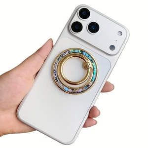 Magnetic shell texture ring holder stand on white smartphone with golden metal frame