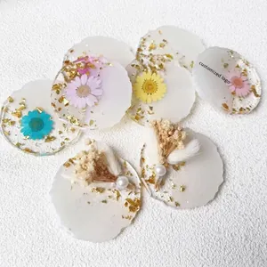 Handmade resin coasters with real dried flowers gold foil and irregular wavy edges