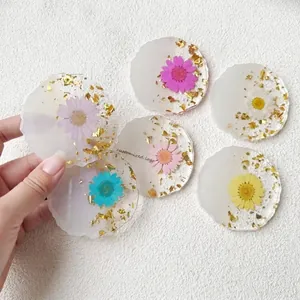 Handmade resin coasters with real dried flowers and gold foil, irregular wavy edges
