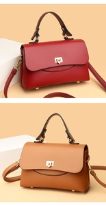 Detailed view of pebbled leather handbags in red and brown with golden twist-lock buckles