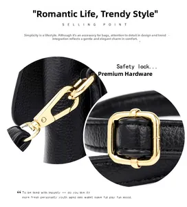 Detailed macro view of high-quality golden metal hardware on black litchi leather handbag