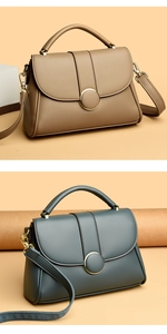 Detailed close-up of textured leather handbags with golden buckles and D-ring hardware