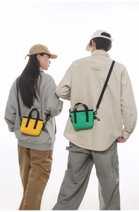Mini canvas tote bags in yellow and green shown on models for urban style
