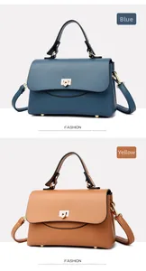 Blue and brown crossbody bags in lychee leather texture with golden metal buckles