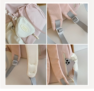Detail view of pink nylon backpack featuring breathable mesh straps and adjustable buckles