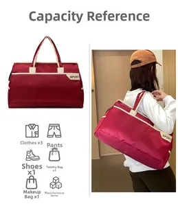 Detail view of red travel sport bag showing large capacity for clothes and shoes