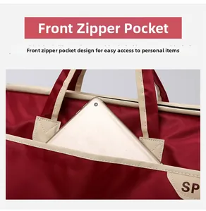 Detail of red nylon travel bag showing front zipper pocket and tablet storage capacity