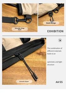 Detail of beige nylon fabric with black metal hook and woven drawstring zipper pull