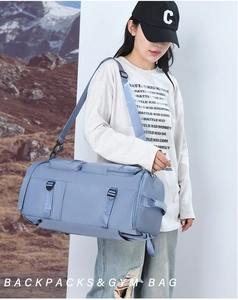 Sac de sport cylindrique bleu pour femme en nylon durable avec bandoulière réglable