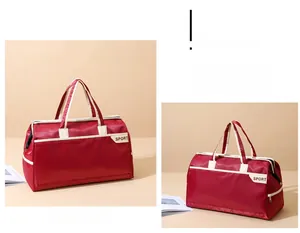 Detail of red travel sports bag with white contrast handles and sport logo patch