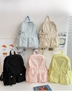 Detailed view of large capacity nylon school backpacks with drawstring and magnetic pockets
