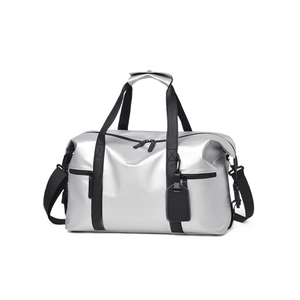 Metallic silver waterproof duffel bag with black handles and adjustable shoulder strap