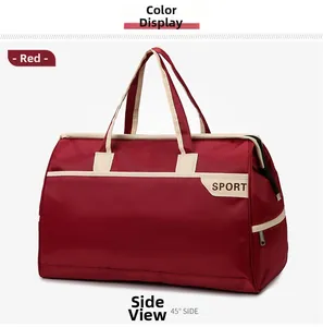 Detail view of the red waterproof travel bag showing the 45-degree side angle and SPORT logo
