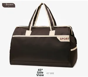 Side view of dark coffee travel bag with sport patch and beige top handles