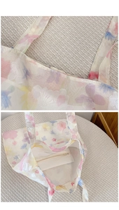 Dettaglio della borsa tote floreale in organza con trama trasparente e tasca interna
