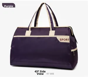 Detail view of purple waterproof travel bag with Sport text and beige carry handles