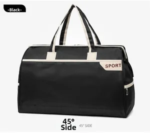 45-degree side view of a large black travel sports duffel bag with beige carry straps
