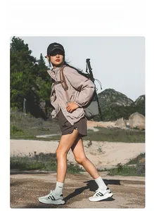 Outdoor hiking backpack featured in a mountain scenery with professional climbing gear