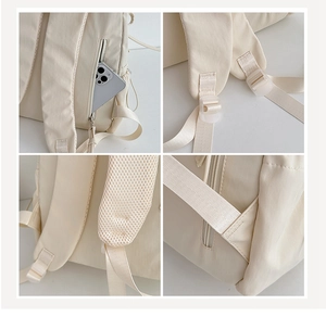 Detail of breathable mesh shoulder straps and hidden anti-theft back pocket on backpack