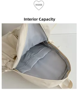 Detailed top view of the spacious internal main compartment and laptop sleeve of the backpack