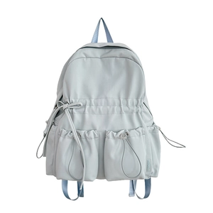 Light blue high capacity school backpack for girls with cute drawstring bow details