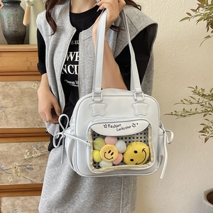 Blue aesthetic Ita bag with transparent window featuring plush sunflowers and star stitching