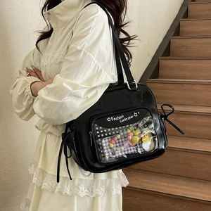 Chic black tote bag with clear PVC window and bow side straps for daily commute